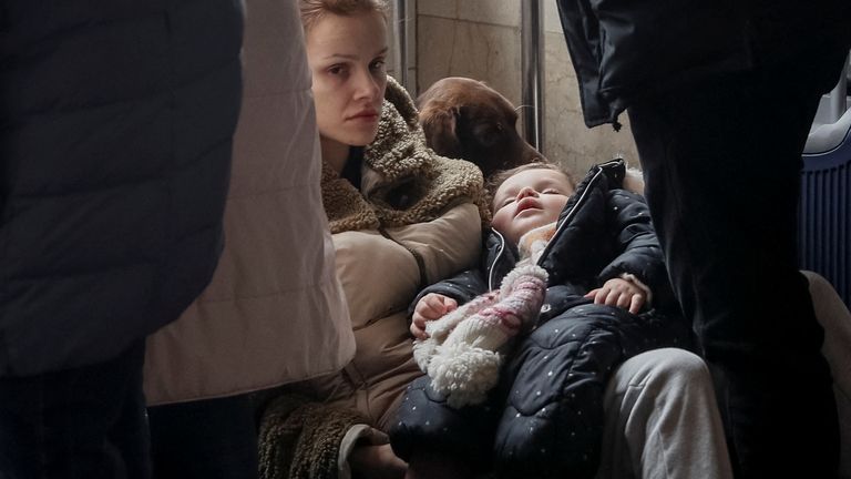 People wait to board an evacuation train from Kyiv to Lviv, at Kyiv central train station, following Russia's invasion of Ukraine, in Kyiv, Ukraine March 2, 2022. REUTERS/Gleb Garanich
