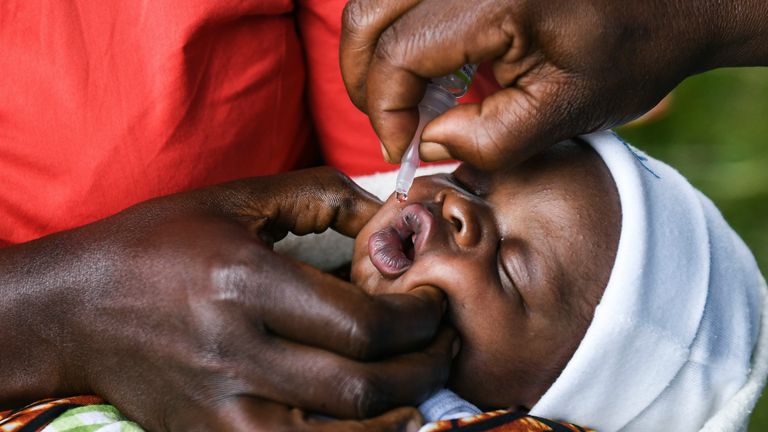 A baby receives a polio vaccine during the Malawi Polio Vaccination Campaign Launch in Lilongwe Malawi, Sunday March 20, 2022. A drive to vaccinate more than 9 million children against polio has been launched this week in four countries in southern and eastern Africa after an outbreak was confirmed in Malawi. (AP Photo/Thoko Chikondi)
PIC:AP