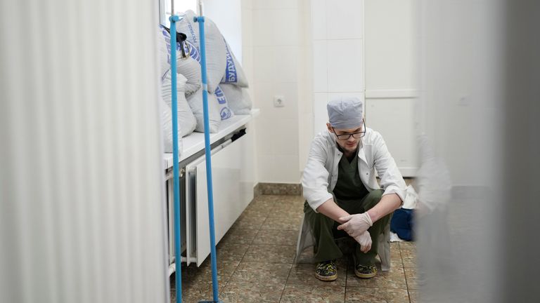 A medical worker collecting his thoughts after Kirill&#39;s death. Pic: AP