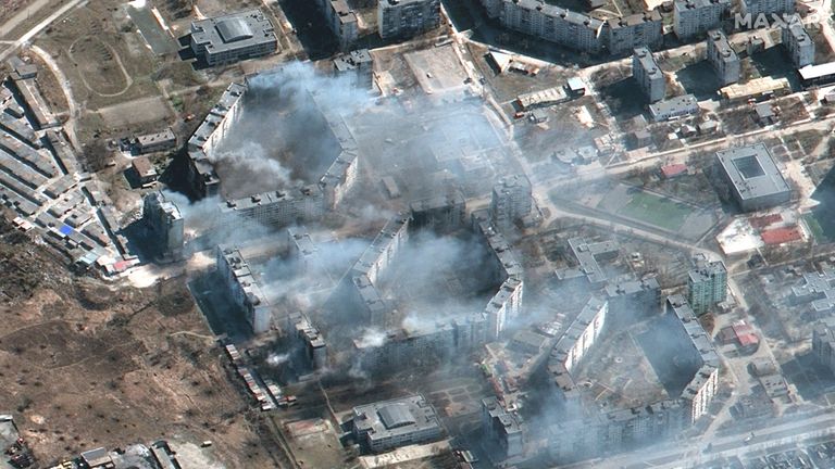 Apartment blocks in Mariupol burn after being shelled. Pic: Satellite image ©2022 Maxar Technologies