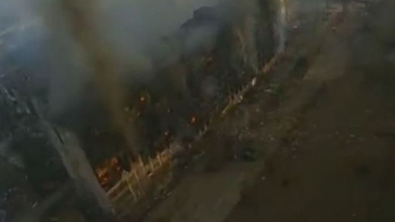 Aerial footage of Mariupol shows many buildings burning or reduced to rubble