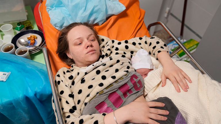 Mariana Vishegirskaya lies in a hospital bed after giving birth to her daughter Veronika, in Mariupol, Ukraine, Friday, March 11, 2022. Vishegirskaya survived the Russian airstrike on a children’s and maternity hospital in Mariupol last Wednesday. (AP Photo/Evgeniy Maloletka)