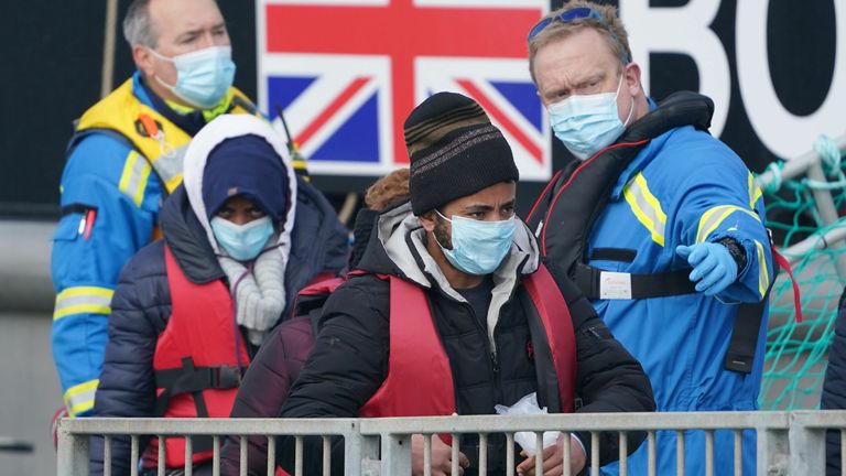 A group of people thought to be migrants are brought in to Dover, Kent, by Border Force officers following a small boat incident in the Channel. Picture date: Thursday March 3, 2022. Credit: Gareth Fuller/PA