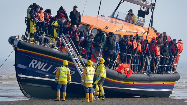 A group of people thought to be migrants are brought in to Dungeness, Kent, onboard the RNLI Lifeboat following a small boat incident in the Channel. Picture date: Thursday March 24, 2022.