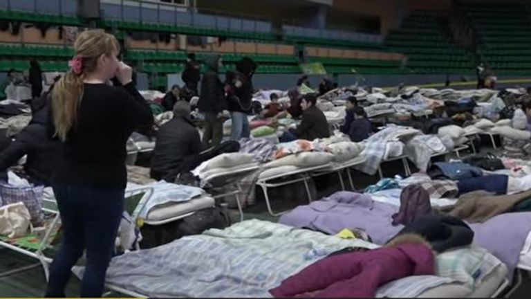 Rows of camp beds have been set up in a sports hall in the Moldovan capital