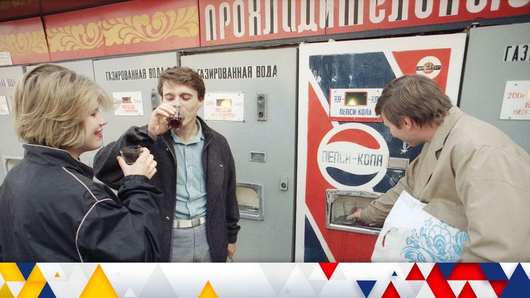 Thirsty Muscovites gather at a Pepsi Cola machine in Moscow, Friday, Sept. 6, 1991. The soda sells for 20 kopeks, about 10 cents a serving. (AP Photo/Peter Dejong)