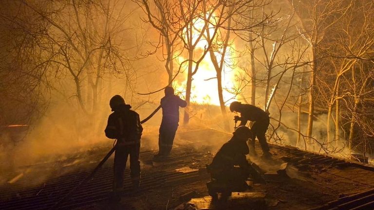 Rescuers work at the site of buildings damaged by shelling, as Russia&#39;s invasion of Ukraine continues, in Mykolaiv, Ukraine, in this handout picture released March 23, 2022. Press service of the State Emergency Service of Ukraine/Handout via REUTERS ATTENTION EDITORS - THIS IMAGE HAS BEEN SUPPLIED BY A THIRD PARTY.
