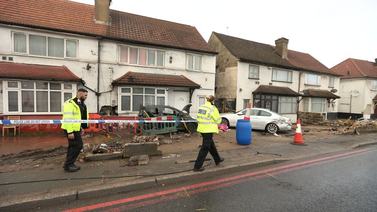 London: Pedestrian killed and passenger critical after BMW crashes into house in Neasden | UK News