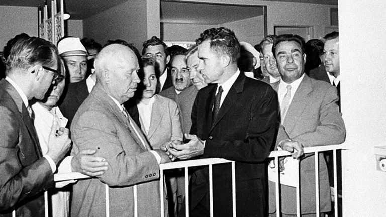U.S. Vice President Richard Nixon, center, and Soviet Premier Nikita Khrushchev, left center, are engaged in a discussion as they stand in front of a kitchen display at the United States exhibit at Moscow&#39;s Sokolniki Park, July 24, 1959. Pic: AP
