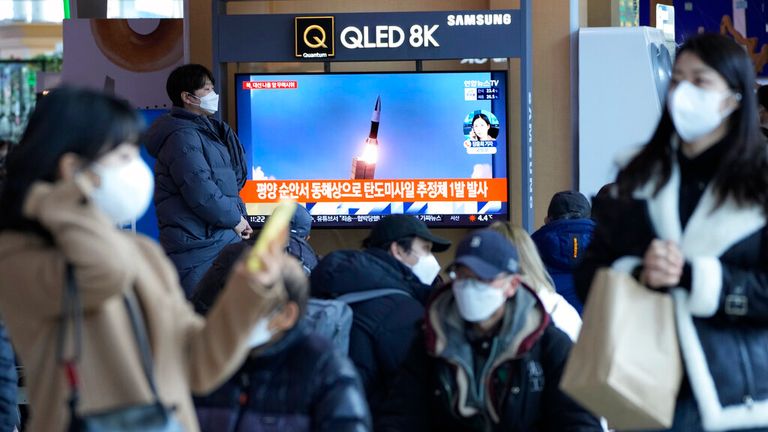 HOLD FOR USE WITH SOUTH KOREA ELECTION WHAT TO KNOW - A TV screen shows a file image of North Korea's missile launch during a news program at the Seoul Railway Station in Seoul, South Korea, Saturday, March 5, 2022. (AP Photo/Ahn Young-joon)