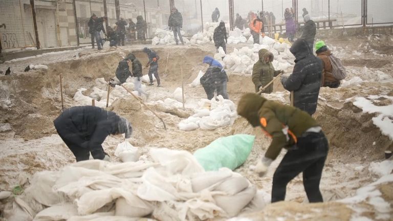 'Each sandbag is someone's life,' a volunteer says