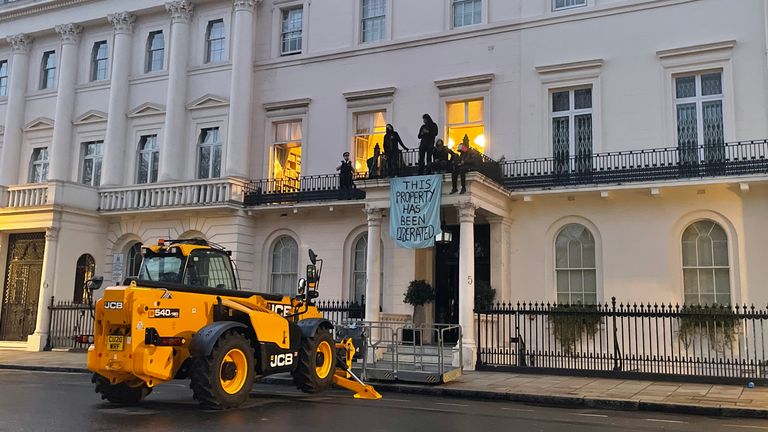 Picture Credit: Aisha Zahid 
- Police  stand by as squatters occupy a mansion reportedly belonging to Russian billionaire Oleg Deripaska, who was placed on Britain&#39;s sanctions list last week, in Belgravia,