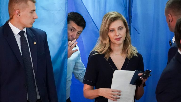 Ukrainian President Volodymyr Zelenskyy, second left, and his wife Olena Zelenska leave a booth at a polling station during a parliamentary election in Kiev, Ukraine, Sunday, July 21, 2019. Ukrainians are voting in an early parliamentary election in which the new party of President Volodymyr Zelenskiy is set to take the largest share of votes. (AP Photo/Evgeniy Maloletka)
PIC:AP

