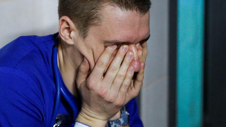 A doctor takes shelter in the basement of a perinatal centre as air raid siren sounds are heard amid Russia&#39;s invasion of Ukraine, in Kyiv, Ukraine, March 2, 2022. REUTERS/Valentyn Ogirenko
