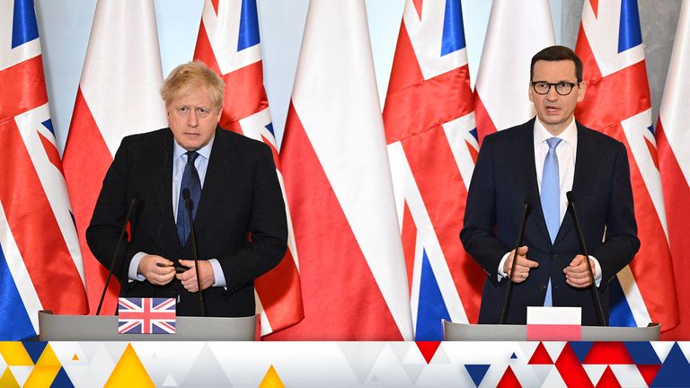 British Prime Minister Boris Johnson sits with Polish Prime Minister Mateusz Morawiecki at the Chancellery in Warsaw, Poland March 1, 2022. Leon Neal/Pool via REUTERS
