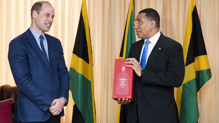 Prince William is greeted by Jamaican PM Andrew Holness