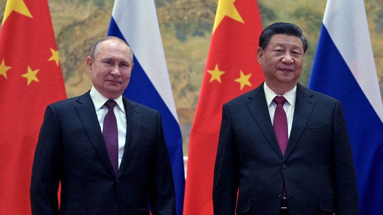 Vladimir Putin and Xi Jinping are pictured in Beijing on 4 February