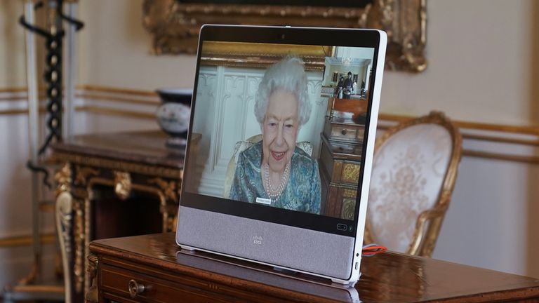 Queen Elizabeth II appears on a screen via videolink from Windsor Castle, where she is in residence, during a virtual audience to receive His Excellency Enkhsukh Battumur, Ambassador of Mongolia, and his wife Ganchimeg Purevdorj, at Buckingham Palace, London. Picture date: Tuesday March 15, 2022.
