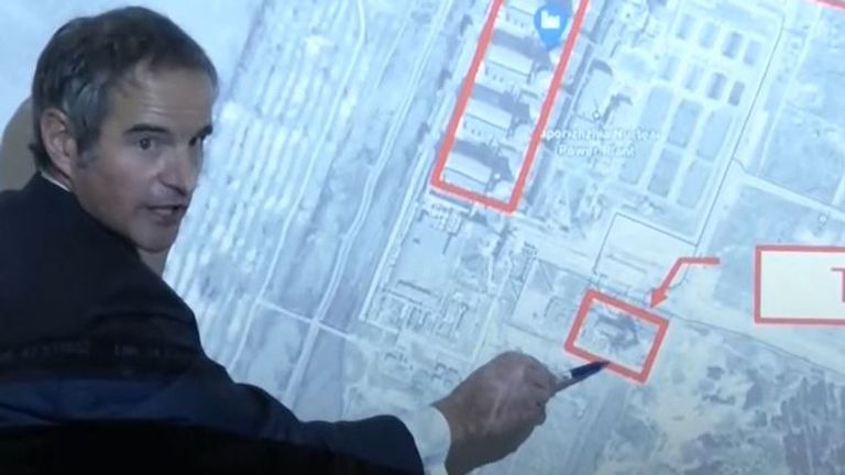Rafael Mariano Grossi shows the location of the building hit by a projectile at Europe&#39;s largest nuclear plant in Ukraine