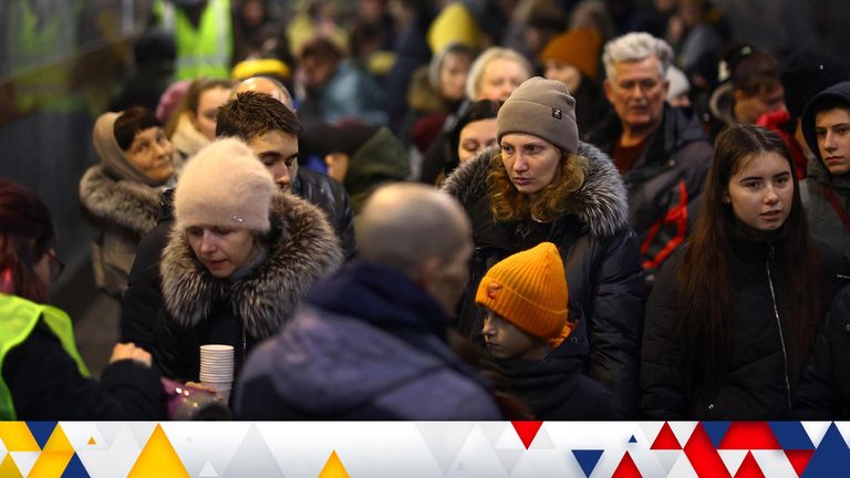 Refugees queue for the last train of the day to Poland after fleeing the ongoing Russian invasion to Ukraine, at the main train station in Lviv, Ukraine, March 17, 2022.  REUTERS/Kai Pfaffenbach