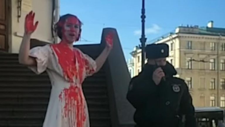 A Russian artist doused herself in fake blood in a solo protest in St. Petersburg on Sunday, March 27, footage by Radio Free Europe / Radio Liberty (RFE/RL) shows.