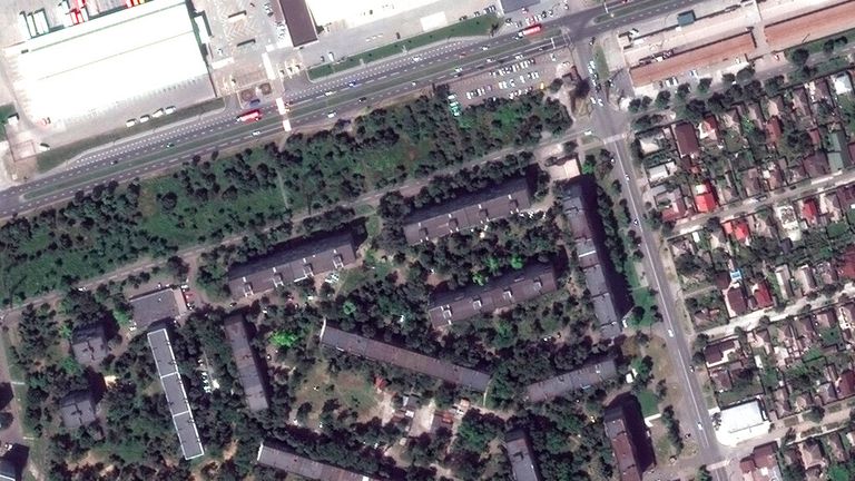 A satellite image shows an apartment block in Mariupol in June last year. A second image (below) shows the same block after nearly three weeks of war. Pic: Maxar Technologies