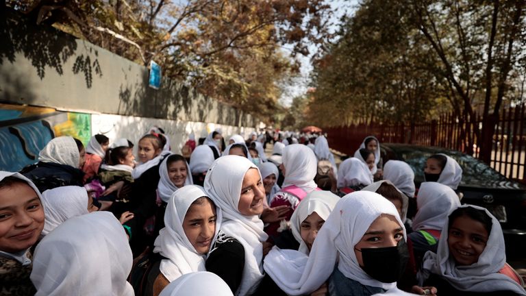Female primary school students leave school after a class in Kabul, Afghanistan, October 25, 2021. The hardline Islamist Taliban movement, which stormed to power earlier this year after ousting the Western-backed government, has allowed all boys and younger girls back to class, but has not let girls attend secondary school. REUTERS/Zohra Bensemra SEARCH "BENSEMRA EDUCATION" FOR THIS STORY. SEARCH "WIDER IMAGE" FOR ALL STORIES TPX IMAGES OF THE DAY