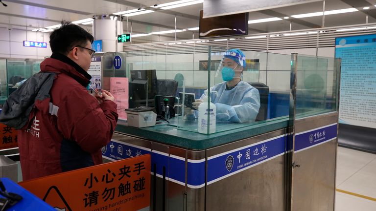 Medical personnel in a mission to help Hong Kong in the Covid-19 Omicron surge pass the border check in Shenzhen in south China&#39;s Guangdong province Thursday, Feb. 17, 2022.