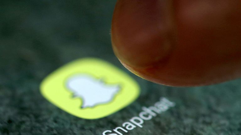 FILE PHOTO: The Snapchat app logo is seen on a smartphone in this picture illustration taken September 15, 2017. REUTERS/Dado Ruvic/Illustration//File Photo
