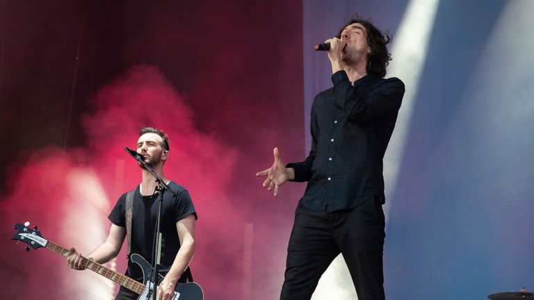 Gary Lightbody (C), singer of the British rock band Snow Patrol, performs on stage at the open air festival &#39;Rock im Park&#39;. Photo by: Daniel Karmann/picture-alliance/dpa/AP Images


