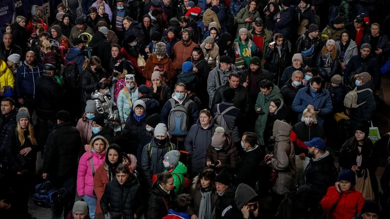People wait to board an evacuation train from Kyiv to Lviv, at Kyiv central train station, following Russia&#39;s invasion of Ukraine, in Kyiv, Ukraine March 2, 2022. REUTERS/Gleb Garanich
