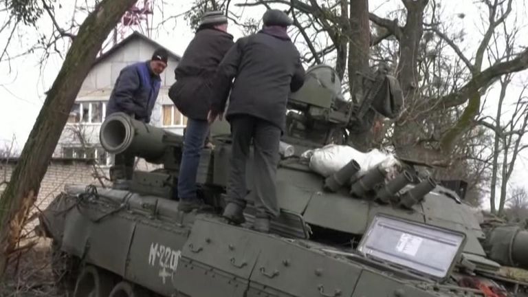Military vehicles are left abandoned in the Ukrainian town of Trostyanets, in the Sumy region
