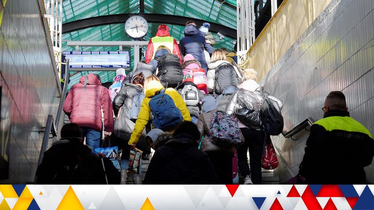 Refugees fleeing Russia&#39;s invasion of Ukraine arrive in Goerlitz via Poland, on their way to Leipzig, at the central station in Goerlitz, Germany, March 22, 2022. REUTERS/Matthias Rietschel