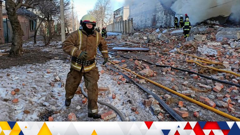 Rescuers work at a site of a warehouse storing products burned after shelling, as Russia's attack on Ukraine continues, in Kharkiv, Ukraine March 16, 2022. REUTERS/Vitalii Hnidyi