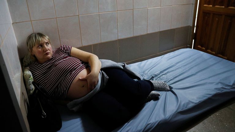 A patient takes shelter in the basement of a perinatal centre as air raid siren sounds are heard amid Russia&#39;s invasion of Ukraine, in Kyiv, Ukraine, March 2, 2022. REUTERS/Valentyn Ogirenko
