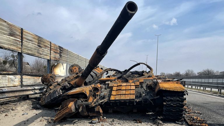 The burnt out carcasses of Russian tanks litter the main highway west of Kyiv. Pic: Chris Cunningham