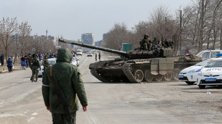 Service members of pro-Russian troops are seen atop of a tank during Ukraine-Russia conflict on the outskirts of the besieged southern port city of Mariupol, Ukraine March 20, 2022. REUTERS/Alexander Ermochenko