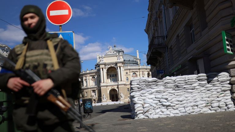 Ukrainian service members patrol in front of the National Academic Theatre of Opera and Ballet, as Russia&#39;s invasion of Ukraine continues, in downtown Odessa, Ukraine, March 17, 2022. REUTERS/Nacho Doce
