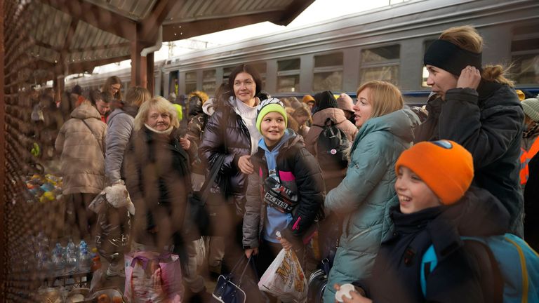 People disembark from a train originating in Ukraine as it arrives on the platform at the station in Przemysl, Poland, Thursday, March 3, 2022. PIC: AP