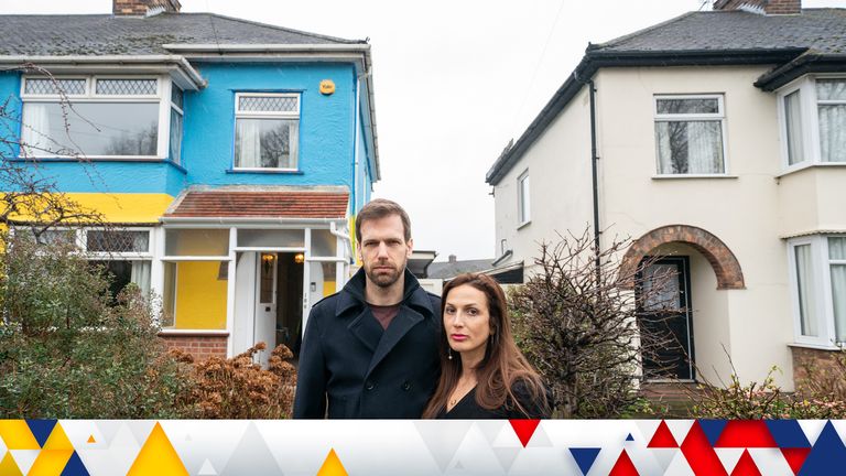 Rend Platings and her husband Michael outside their home in Cambridge, which they have painted in the colours of the Ukraine flag in a show of support for friends in the country. Picture date: Wednesday March 2, 2022.