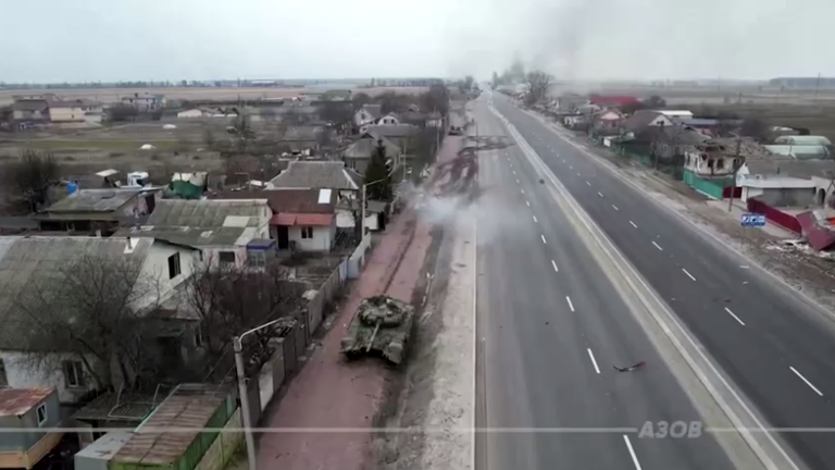 Tanks are seen being destroyed on the outskirts of Brovary, Ukraine, in this screengrab from an undated handout video obtained by Reuters on March 10, 2022. Azov/Handout via REUTERS