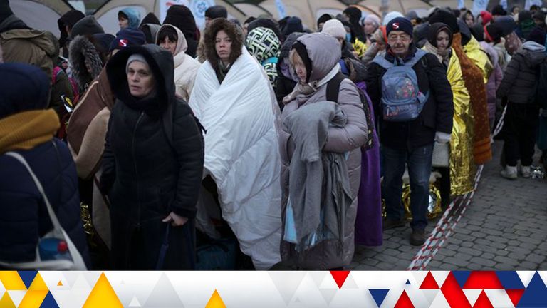 Refugees wait in a crowd for transport after fleeing from the Ukraine and arriving at the border crossing in Medyka, Poland, Monday, March 7, 2022. (AP Photo/Markus Schreiber)
Pic: AP