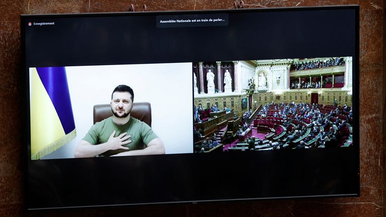  Ukrainian President Volodymyr Zelenskyy addresses French lawmakers via video link, amid Russia&#39;s invasion of Ukraine, at the National Assembly in Paris, France March 23, 2022. REUTERS/Benoit Tessier