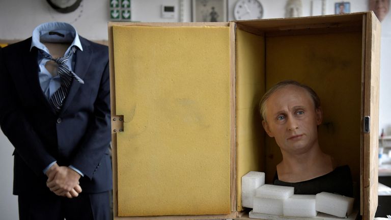 TOPSHOT - The wax statue of Russian President Vladimir Putin is being packed is a box before it is stored in the reseve, as a reaction to Russia&#39;s invasion of Ukraine on March 1, 2022 at the Grevin museum in Paris. (Photo by JULIEN DE ROSA / AFP) (Photo by JULIEN DE ROSA/AFP via Getty Images)
