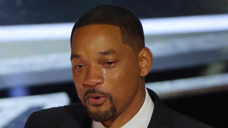 Will Smith cries as he accepts the Oscar for Best Actor in "King Richard" at the 94th Academy Awards in Hollywood, Los Angeles, California, U.S., March 27, 2022. REUTERS/Brian Snyder