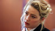 Actor Amber Heard looks on during Johnny Depp's defamation trial against her at the Fairfax County Circuit Courthouse in Fairfax, Virginia, U.S., April 13, 2022. REUTERS/Evelyn Hockstein/Pool 