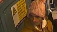 The attacker was seen wearing a pink fluffy bobble hat. Pic: Metropolitan Police