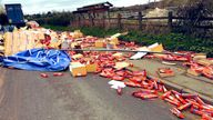 Oh crumbs! Hundreds of packets of McVitie&#39;s biscuits fell off a lorry. Pic: Erewash Response 