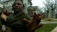 A Grand Rapids Police officer grasps the shirt of Patrick Lyoya during a traffic stop, shortly before Lyoya was shot dead by the officer during a scuffle on a suburban front lawn in Grand Rapids, Michigan, U.S. April 4, 2022 in a still image from police body camera video. Video taken April 4, 2022. Pic: Grand Rapids Police