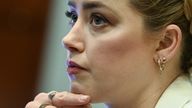 Actor Amber Heard listens in the courtroom during ex-husband Johnny Depp's defamation trial against her, at the Fairfax County Circuit Courthouse in Fairfax, Virginia, U.S., April 26, 2022. Brendan Smialowski/ Pool via REUTERS 